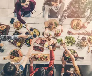 Group of dinner guests around a table