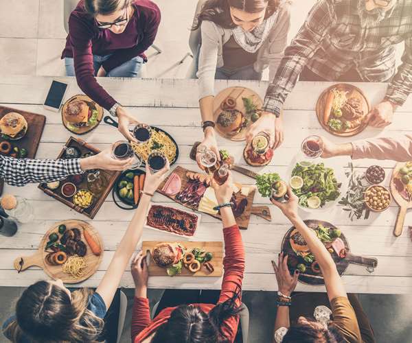 Group of dinner guests around a table